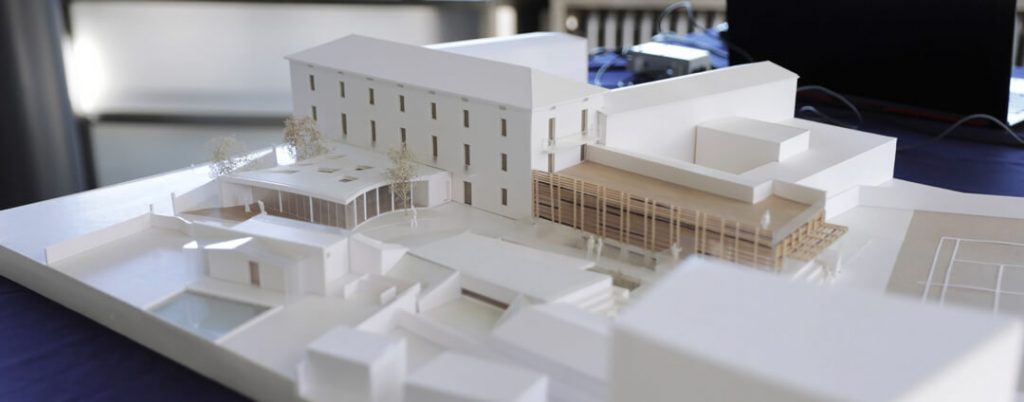 scale model image of the new tennis club in association with automha warehouses